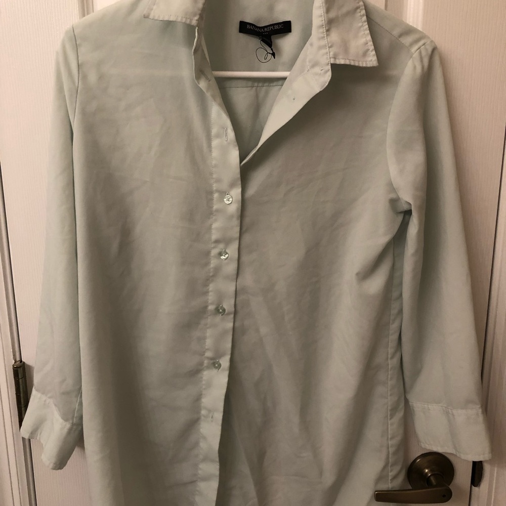 Light green blouse. Perfect for shorts or jeans.